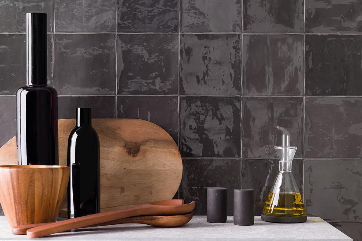 Black Zellige tiles kitchen wall by Porcelanosa